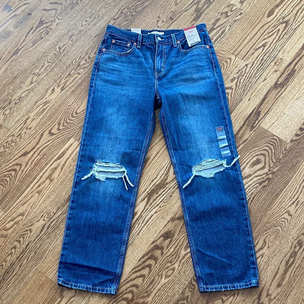 NWT Levi’s size 29 Low Pro  mid rise medium wash distressed jeans straight leg
